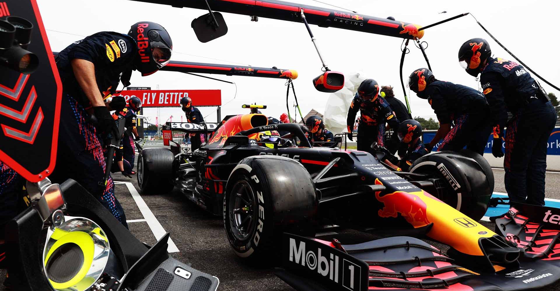 LE CASTELLET, FRANCE - JUNE 20: Sergio Perez of Mexico driving the (11) Red Bull Racing RB16B Honda makes a pitstop during the F1 Grand Prix of France at Circuit Paul Ricard on June 20, 2021 in Le Castellet, France. (Photo by Mark Thompson/Getty Images)