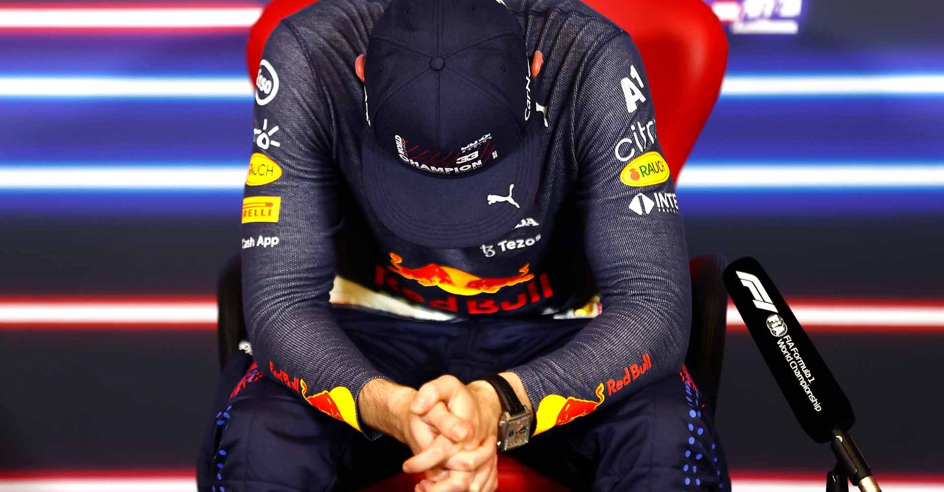 ABU DHABI, UNITED ARAB EMIRATES - DECEMBER 12: Race winner and 2021 F1 World Drivers Champion Max Verstappen of Netherlands and Red Bull Racing talks in a press conference after the F1 Grand Prix of Abu Dhabi at Yas Marina Circuit on December 12, 2021 in Abu Dhabi, United Arab Emirates. (Photo by Andy Hone - Pool/Getty Images)