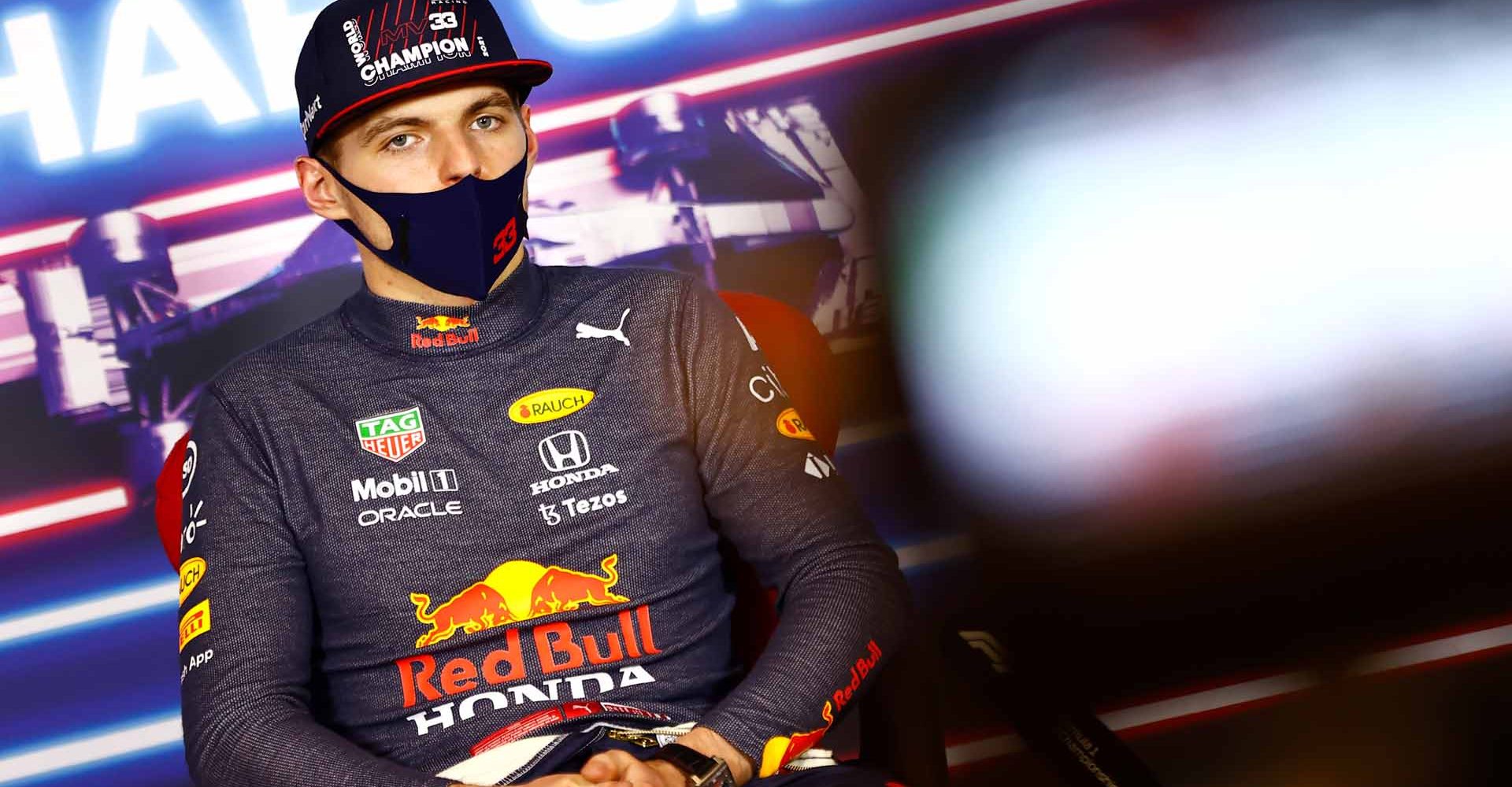 ABU DHABI, UNITED ARAB EMIRATES - DECEMBER 12: Race winner and 2021 F1 World Drivers Champion Max Verstappen of Netherlands and Red Bull Racing talks in a press conference after the F1 Grand Prix of Abu Dhabi at Yas Marina Circuit on December 12, 2021 in Abu Dhabi, United Arab Emirates. (Photo by Andy Hone - Pool/Getty Images)