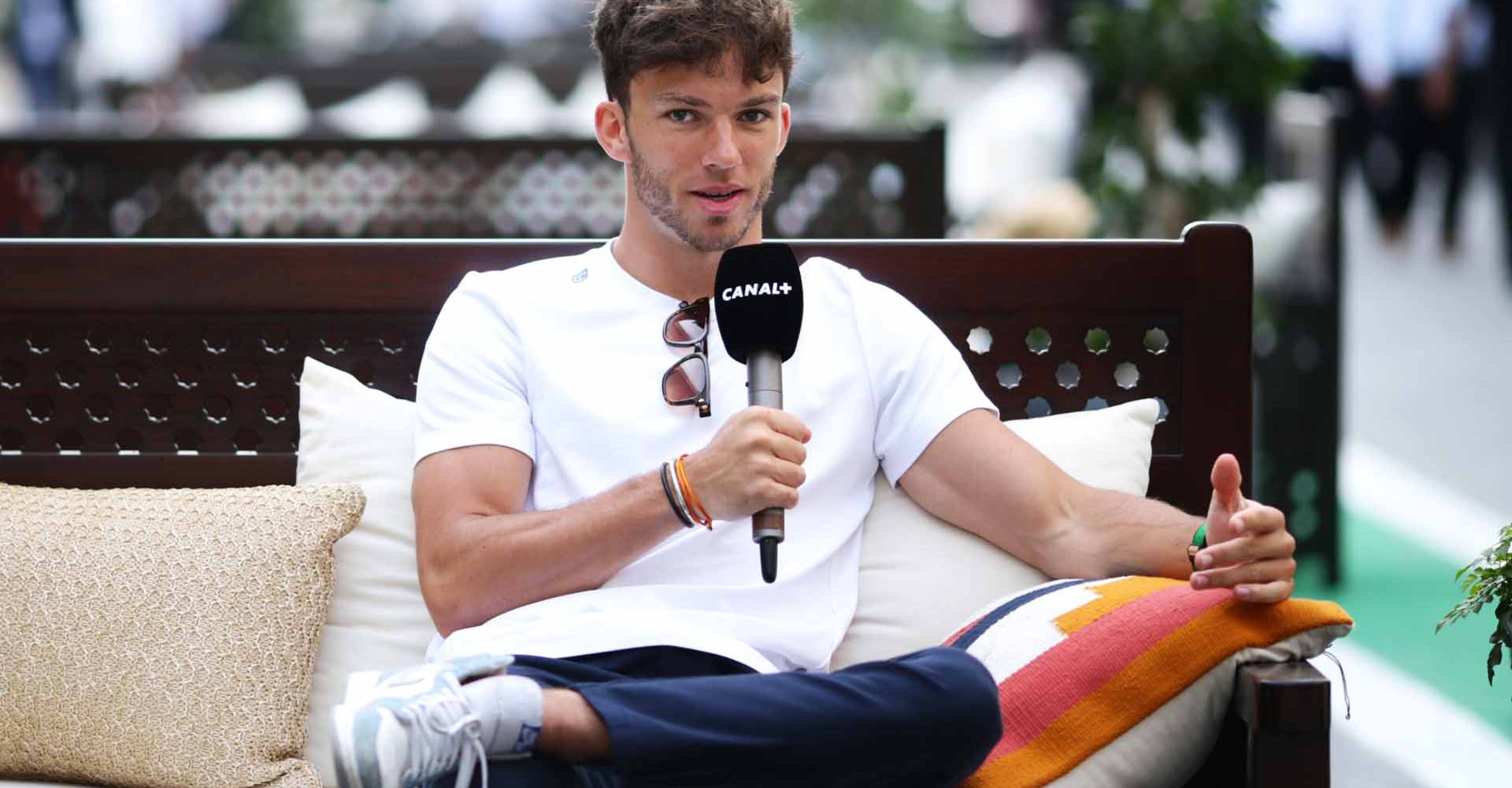 JEDDAH, SAUDI ARABIA - MARCH 24: Pierre Gasly of France and Scuderia AlphaTauri talks to the media in the Paddock during previews ahead of the F1 Grand Prix of Saudi Arabia at the Jeddah Corniche Circuit on March 24, 2022 in Jeddah, Saudi Arabia. (Photo by Peter Fox/Getty Images) Canal+