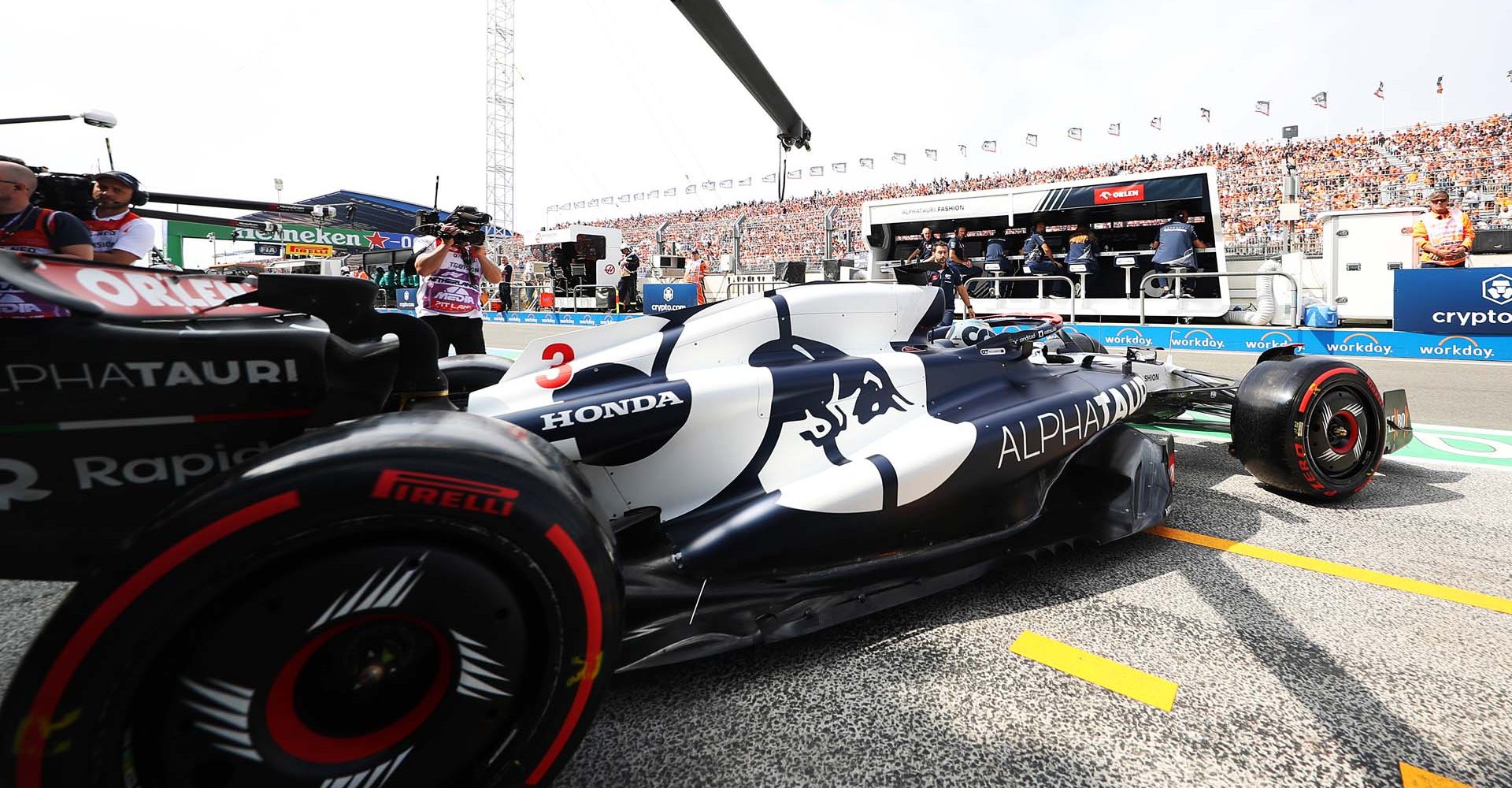 ZANDVOORT, NETHERLANDS - AUGUST 25: Daniel Ricciardo of Australia driving the (3) Scuderia AlphaTauri AT04 leaves the garage during practice ahead of the F1 Grand Prix of The Netherlands at Circuit Zandvoort on August 25, 2023 in Zandvoort, Netherlands. (Photo by Peter Fox/Getty Images)