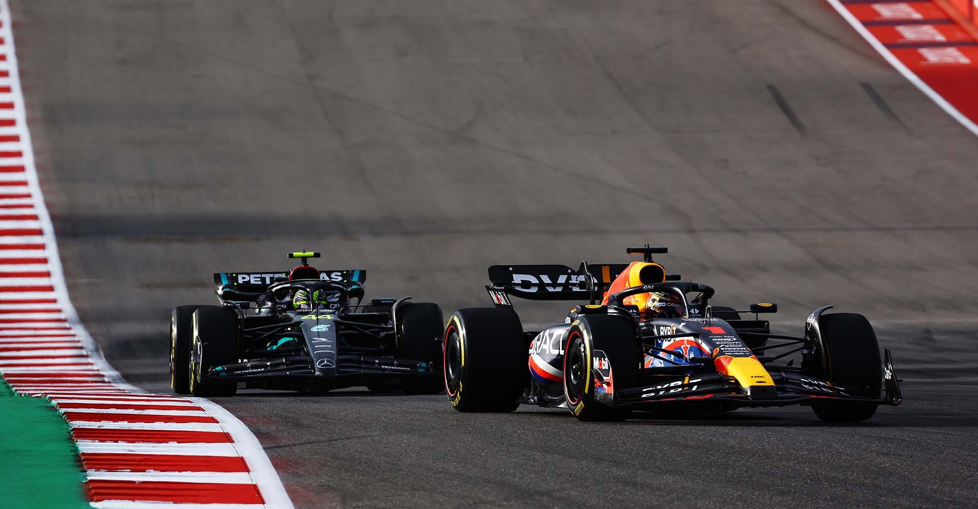 AUSTIN, TEXAS - OCTOBER 21: Max Verstappen of the Netherlands driving the (1) Oracle Red Bull Racing RB19 leads Lewis Hamilton of Great Britain driving the (44) Mercedes AMG Petronas F1 Team W14 during the Sprint ahead of the F1 Grand Prix of United States at Circuit of The Americas on October 21, 2023 in Austin, Texas. (Photo by Mark Thompson/Getty Images)