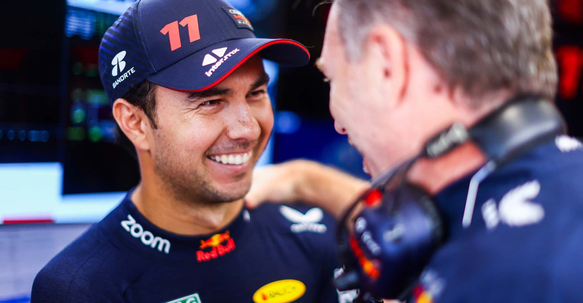 SAO PAULO, BRAZIL - NOVEMBER 04:  Sergio Perez of Mexico and Oracle Red Bull Racing talks with Red Bull Racing Team Principal Christian Horner in the garage prior to the Sprint ahead of the F1 Grand Prix of Brazil at Autodromo Jose Carlos Pace on November 04, 2023 in Sao Paulo, Brazil. (Photo by Mark Thompson/Getty Images) // Getty Images / Red Bull Content Pool // SI202311040274 // Usage for editorial use only //