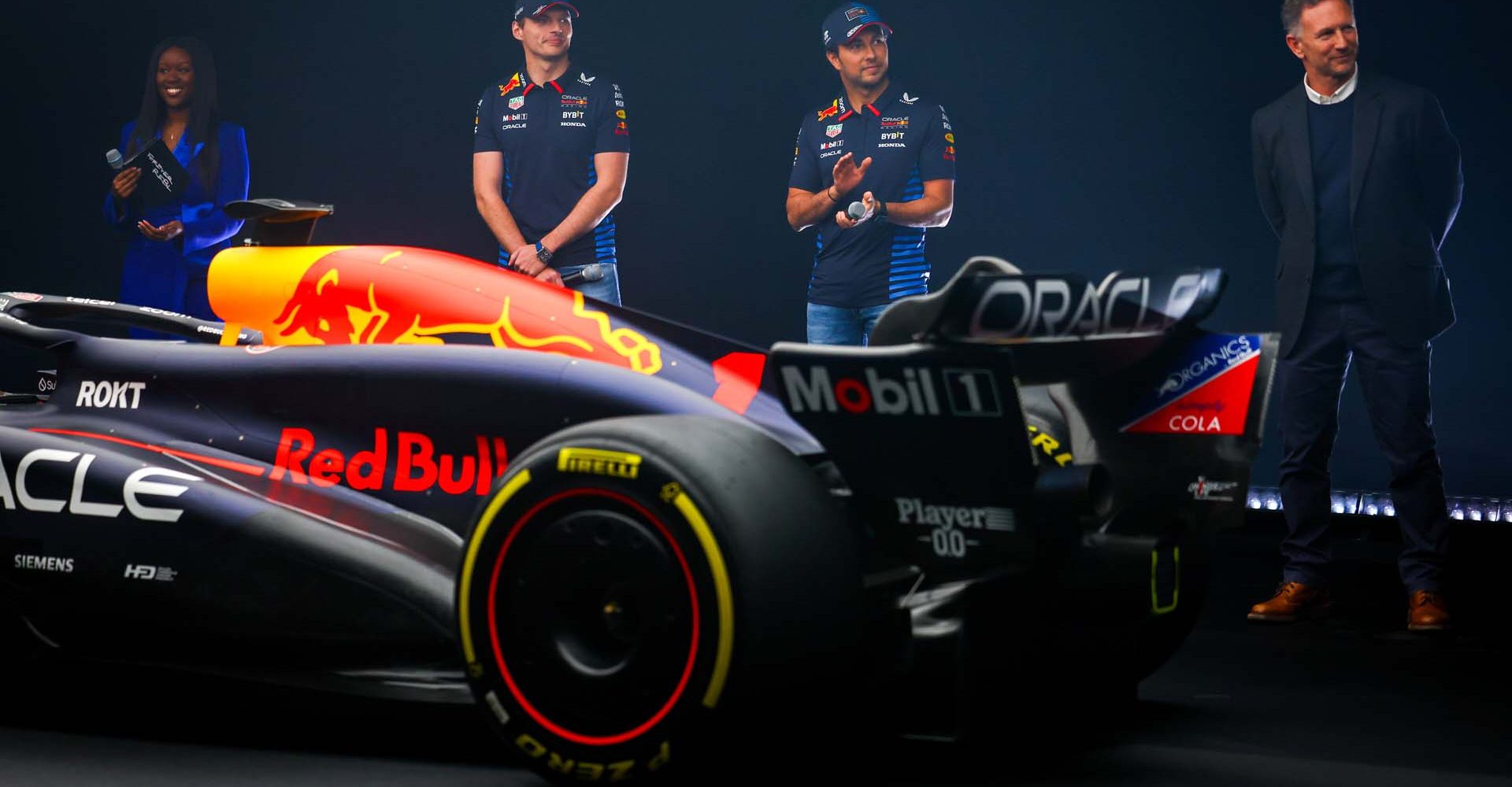 MILTON KEYNES, ENGLAND - FEBRUARY 15: Max Verstappen of the Netherlands and Oracle Red Bull Racing, Sergio Perez of Mexico and Oracle Red Bull Racing and Red Bull Racing Team Principal Christian Horner stand with the RB20 during the Oracle Red Bull Racing RB20 car launch at Red Bull Racing Factory on February 15, 2024 in Milton Keynes, England. (Photo by Mark Thompson/Getty Images for Red Bull Racing) // SI202402150752 // Usage for editorial use only //