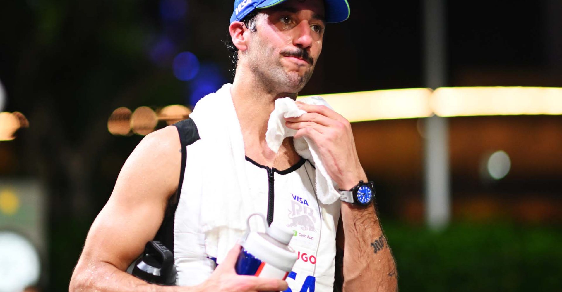 SINGAPORE, SINGAPORE - SEPTEMBER 22: 18th Placed Daniel Ricciardo of Australia and Visa Cash App RB looks on in the Paddock after the F1 Grand Prix of Singapore at Marina Bay Street Circuit on September 22, 2024 in Singapore, Singapore. (Photo by Rudy Carezzevoli/Getty Images) // Getty Images / Red Bull Content Pool // SI202409220389 // Usage for editorial use only //