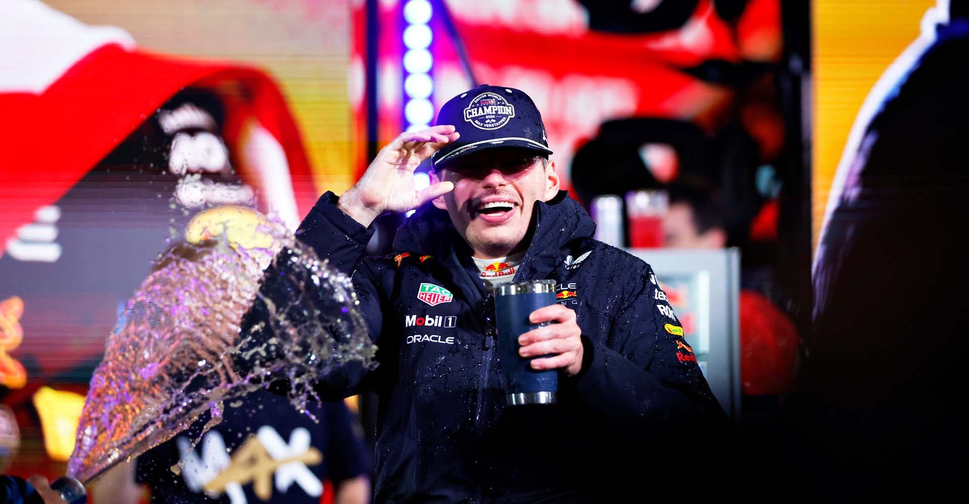 LAS VEGAS, NEVADA - NOVEMBER 23: 2024 F1 World Drivers Champion Max Verstappen of the Netherlands and Oracle Red Bull Racing celebrates with his team in the Paddock after the F1 Grand Prix of Las Vegas at Las Vegas Strip Circuit on November 23, 2024 in Las Vegas, Nevada. (Photo by Chris Graythen/Getty Images) // Getty Images / Red Bull Content Pool // SI202411240449 // Usage for editorial use only //