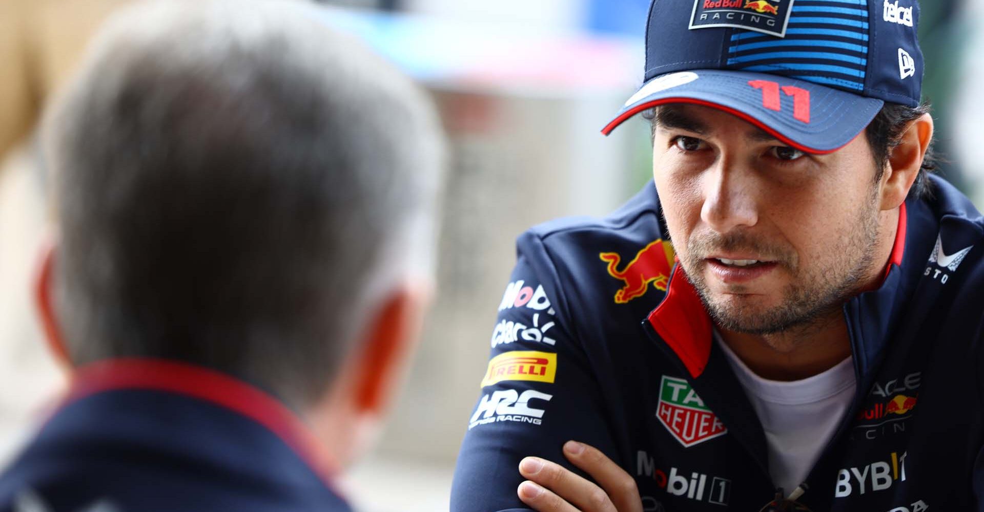 LUSAIL CITY, QATAR - DECEMBER 01: Sergio Perez of Mexico and Oracle Red Bull Racing talks with Oracle Red Bull Racing Team Principal Christian Horner in the Paddock prior to the F1 Grand Prix of Qatar at Lusail International Circuit on December 01, 2024 in Lusail City, Qatar. (Photo by Mark Thompson/Getty Images) // Getty Images / Red Bull Content Pool // SI202412010107 // Usage for editorial use only //