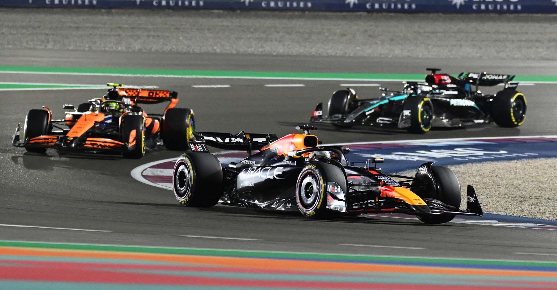 LUSAIL CITY, QATAR - DECEMBER 01: Max Verstappen of the Netherlands driving the (1) Oracle Red Bull Racing RB20 leads Lando Norris of Great Britain driving the (4) McLaren MCL38 Mercedes and George Russell of Great Britain driving the (63) Mercedes AMG Petronas F1 Team W15 during the F1 Grand Prix of Qatar at Lusail International Circuit on December 01, 2024 in Lusail City, Qatar. (Photo by Clive Mason/Getty Images) // Getty Images / Red Bull Content Pool // SI202412010187 // Usage for editorial use only //