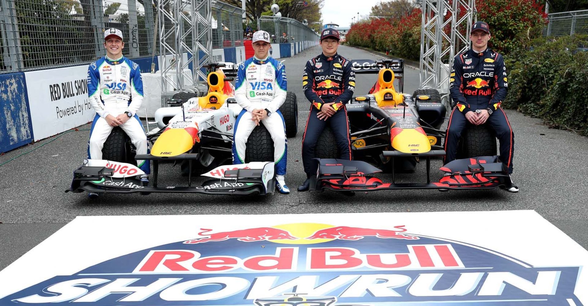 TOKYO, JAPAN - APRIL 02: Liam Lawson of New Zealand and Visa Cash App Racing Bulls, Isack Hadjar of France and Visa Cash App Racing Bulls, Yuki Tsunoda of Japan and Oracle Red Bull Racing and Max Verstappen of the Netherlands and Oracle Red Bull Racing pose for a photo during an Oracle Red Bull Racing Show Run on April 02, 2025 in Tokyo, Japan. (Photo by Mark Thompson/Getty Images for Oracle Red Bull Racing) // Getty Images / Red Bull Content Pool // SI202504020328 // Usage for editorial use only //