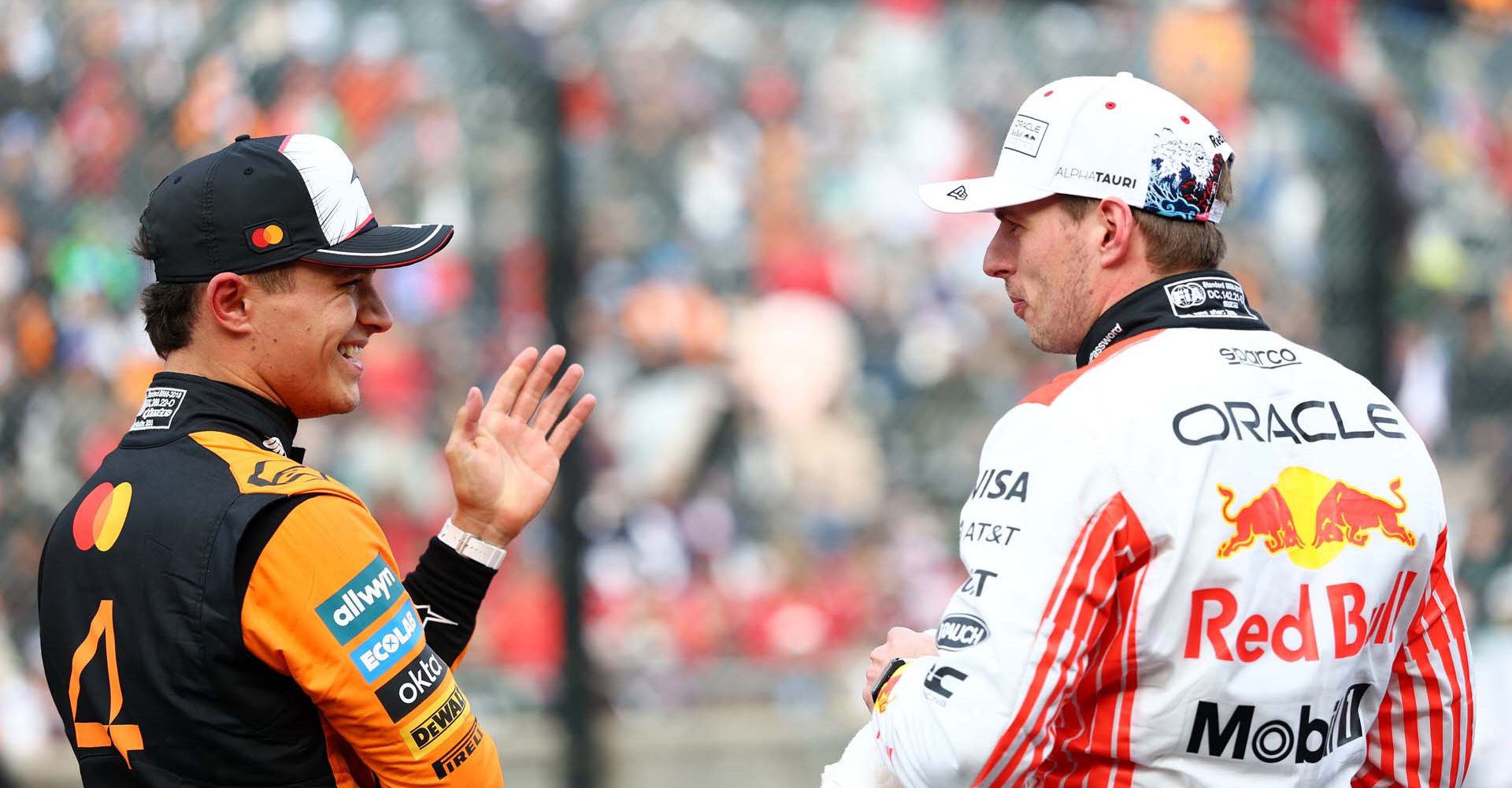 SUZUKA, JAPAN - APRIL 05: Second placed qualifier Lando Norris of Great Britain and McLaren and Pole position qualifier Max Verstappen of the Netherlands and Oracle Red Bull Racing talk in parc ferme during qualifying ahead of the F1 Grand Prix of Japan at Suzuka Circuit on April 05, 2025 in Suzuka, Japan. (Photo by Mark Thompson/Getty Images) // Getty Images / Red Bull Content Pool // SI202504050220 // Usage for editorial use only //