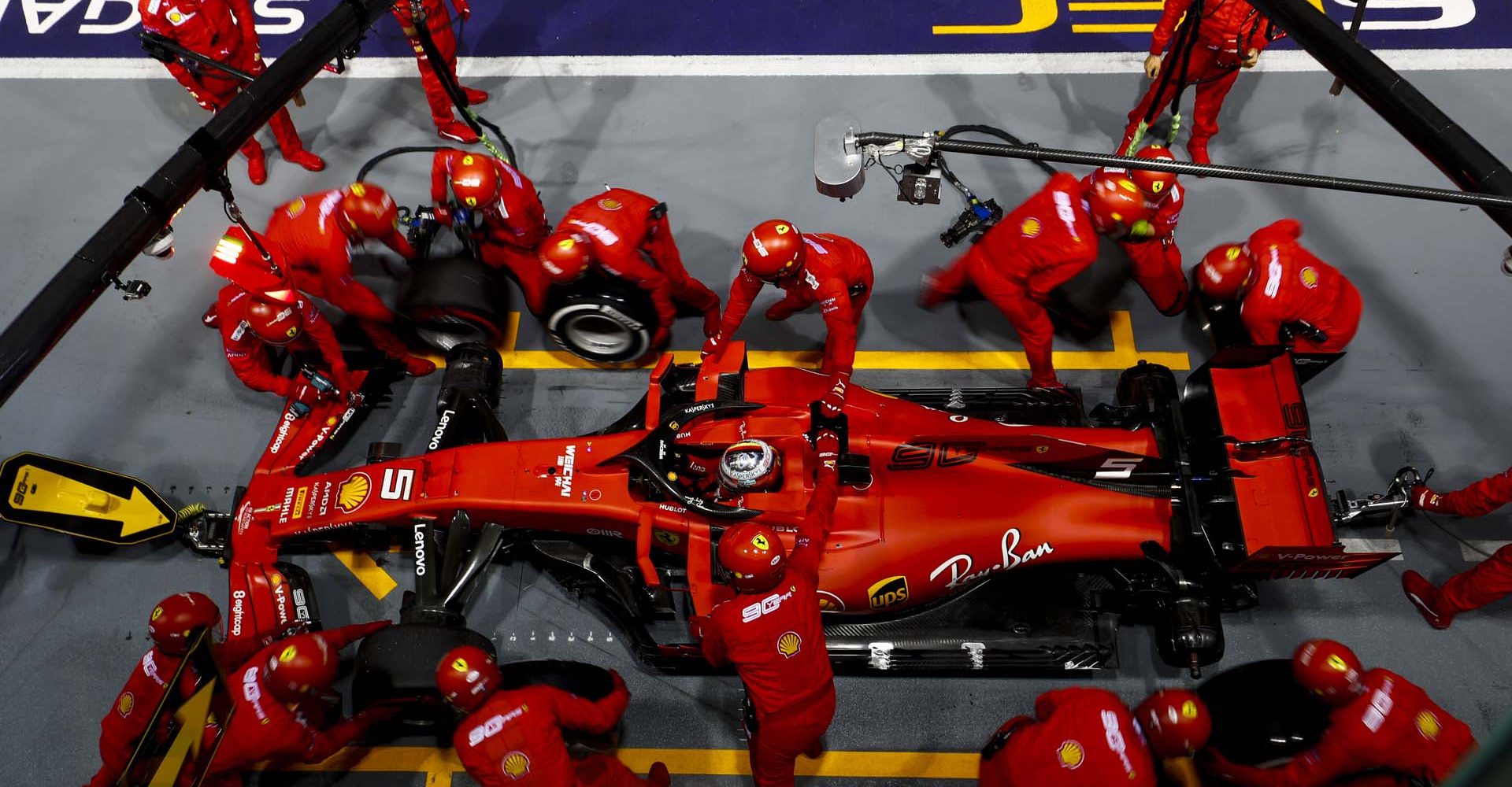 SINGAPORE STREET CIRCUIT, SINGAPORE - SEPTEMBER 22: Sebastian Vettel, Ferrari SF90 pit stop during the Singapore GP at Singapore Street Circuit on September 22, 2019 in Singapore Street Circuit, Singapore. (Photo by Sam Bloxham / LAT Images)