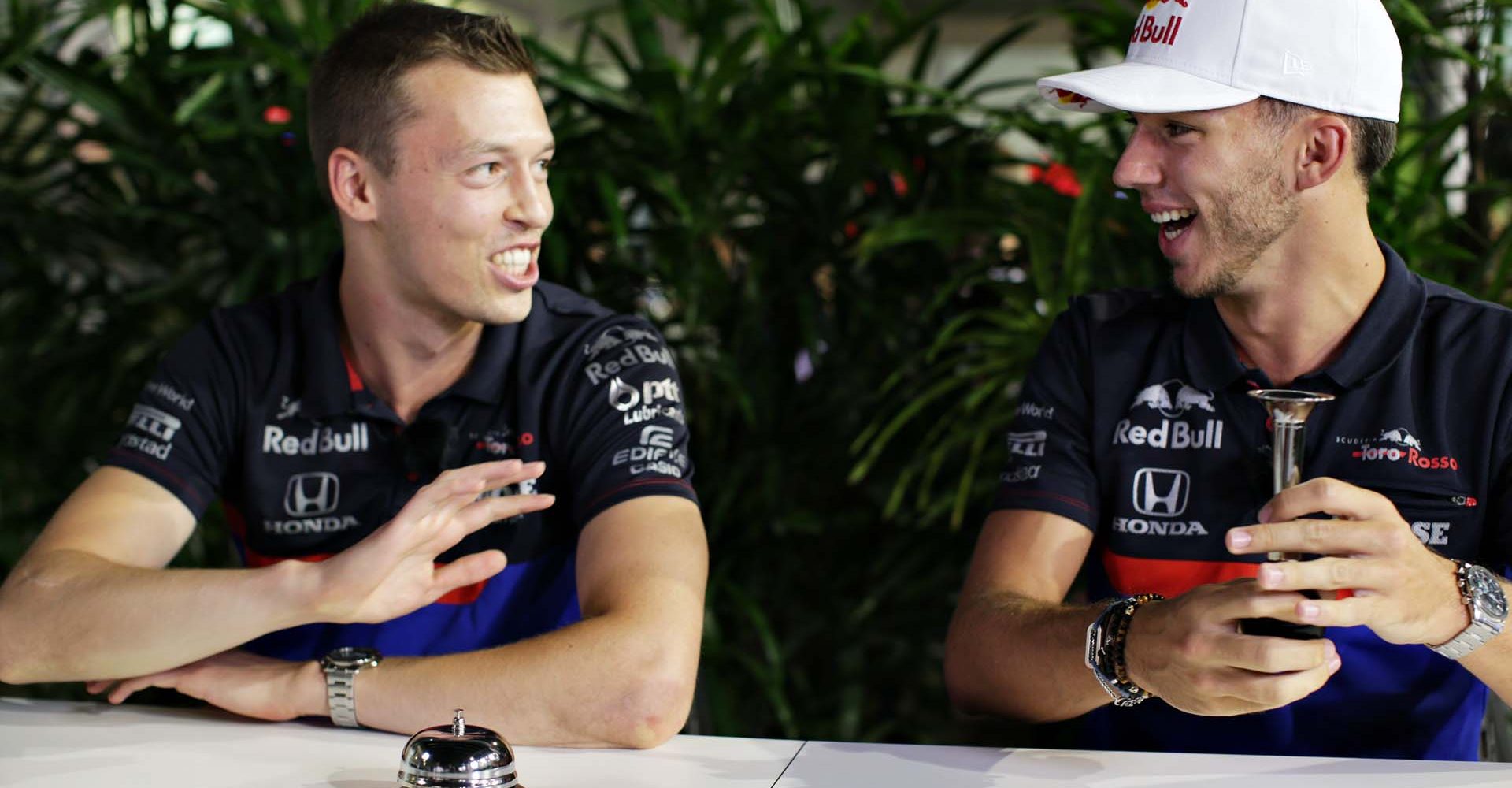 SINGAPORE, SINGAPORE - SEPTEMBER 19: Daniil Kvyat of Russia and Scuderia Toro Rosso and Pierre Gasly of France and Scuderia Toro Rosso laugh in the Paddock during previews ahead of the F1 Grand Prix of Singapore at Marina Bay Street Circuit on September 19, 2019 in Singapore. (Photo by Peter Fox/Getty Images) // Getty Images / Red Bull Content Pool  // AP-21MATNA1N1W11 // Usage for editorial use only //